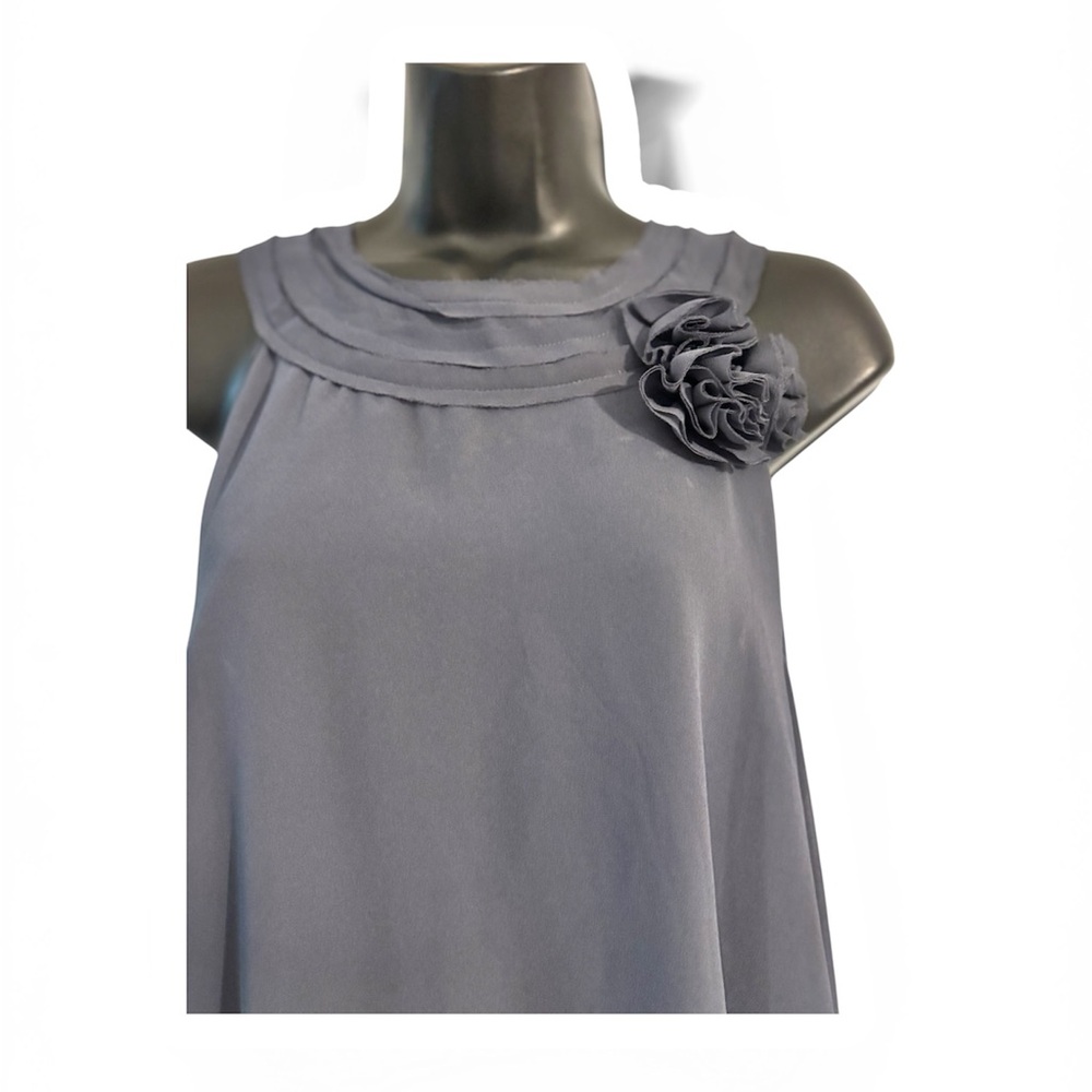 Adiva Navy Blue Sleeveless Swing Blouse with Floral Accent